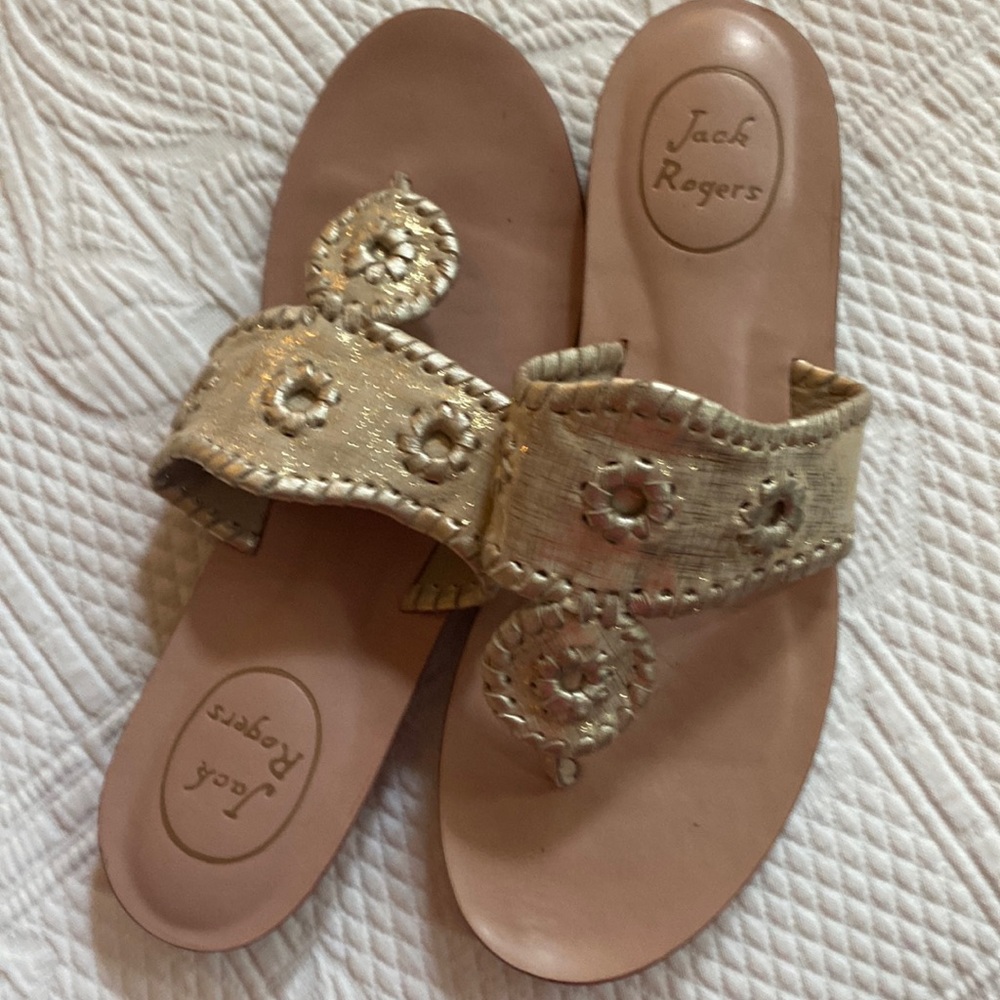 Not a copyJack Rogers gold sandals; not a copy.Real Jack Rogers sandals.